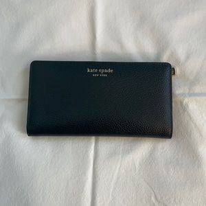 kate spade staci slim bi-fold wallet.